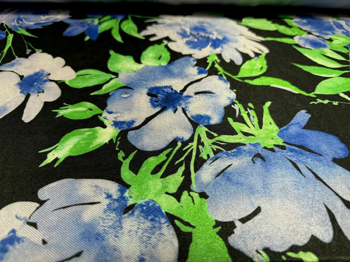 Stretch spandex satin jersey fabric, per metre - wild rose floral print - black blue & green