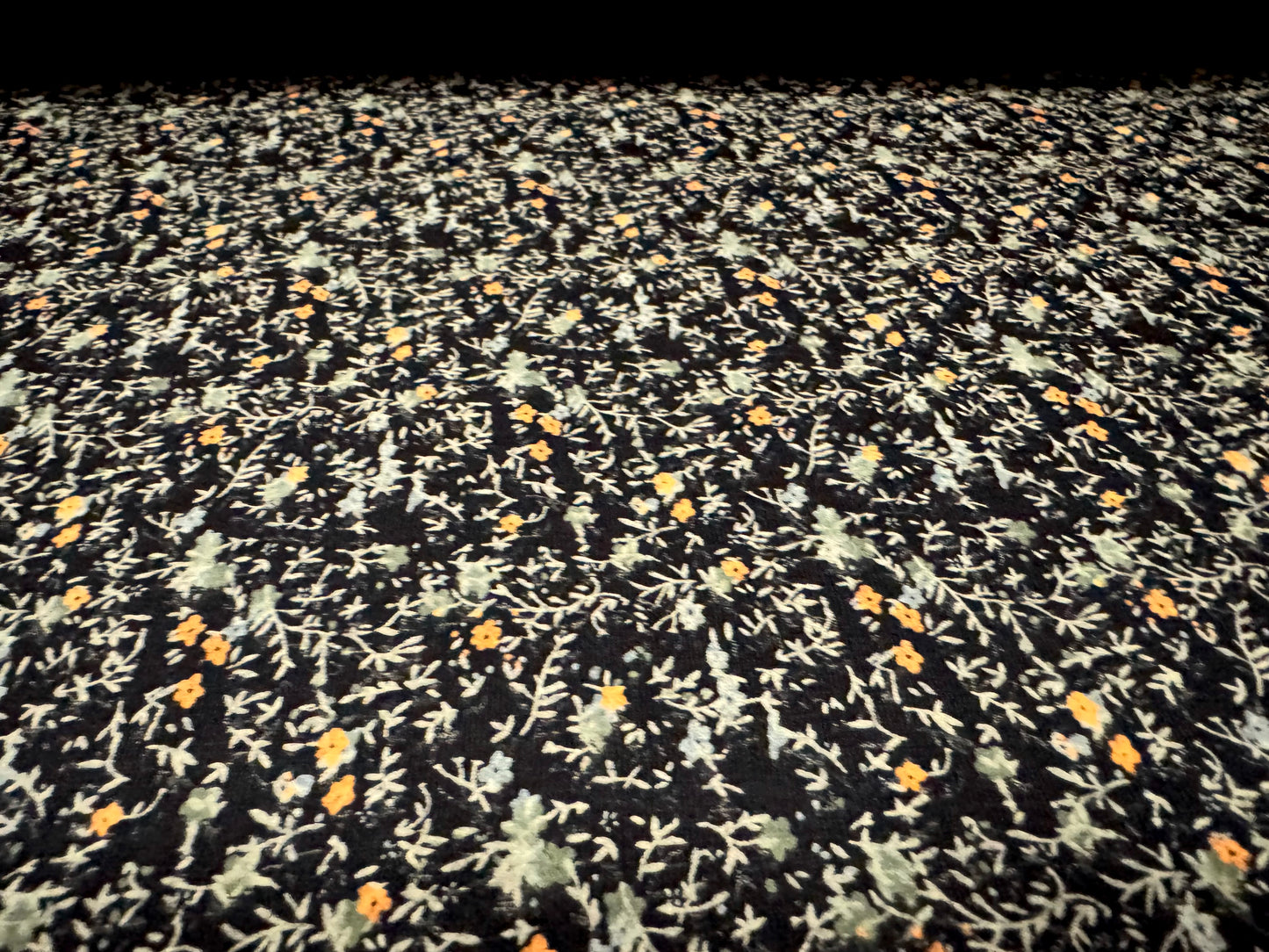 Viscose spandex stretch single jersey fabric, per metre - small ditsy flower print - black sage & orange