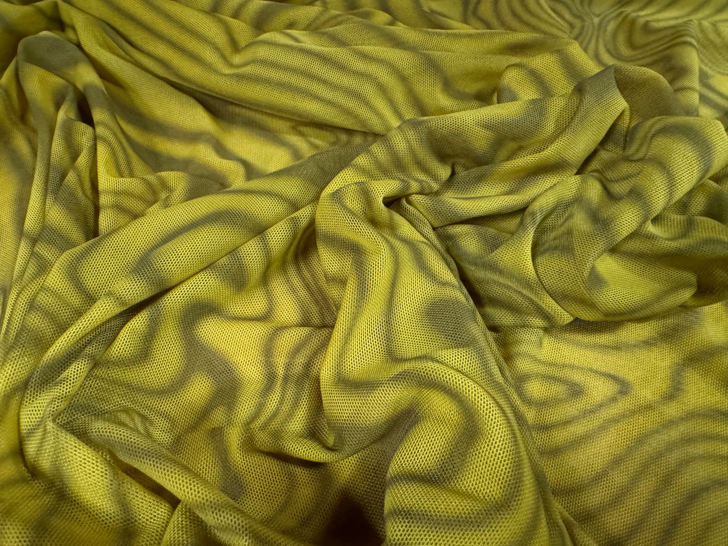 Power mesh net stretch spandex fabric, per metre - swirl print - mustard