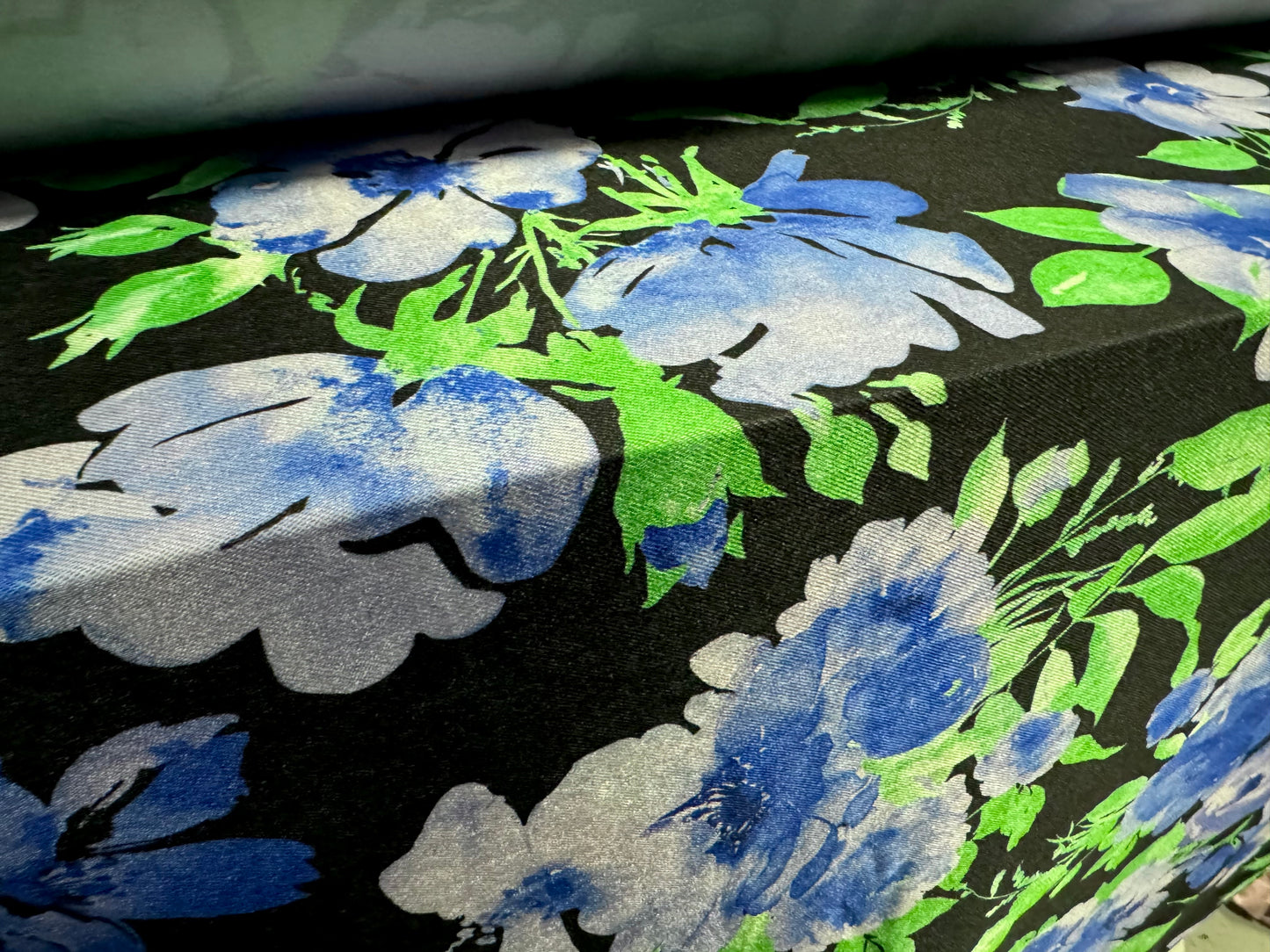 Stretch spandex satin jersey fabric, per metre - wild rose floral print - black blue & green