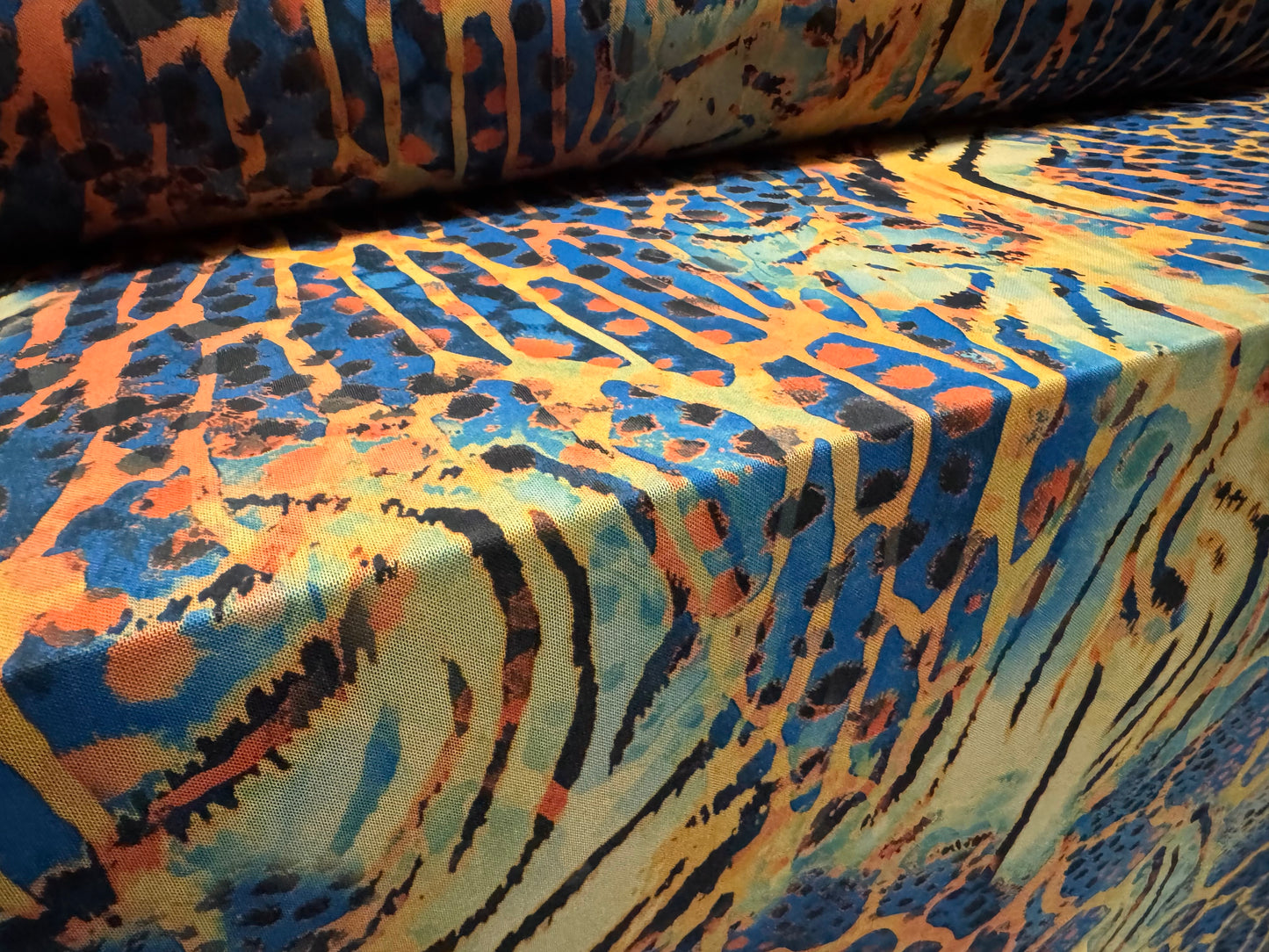 Power mesh net stretch spandex fabric, per metre - Crazy Tiger print - blue & amber