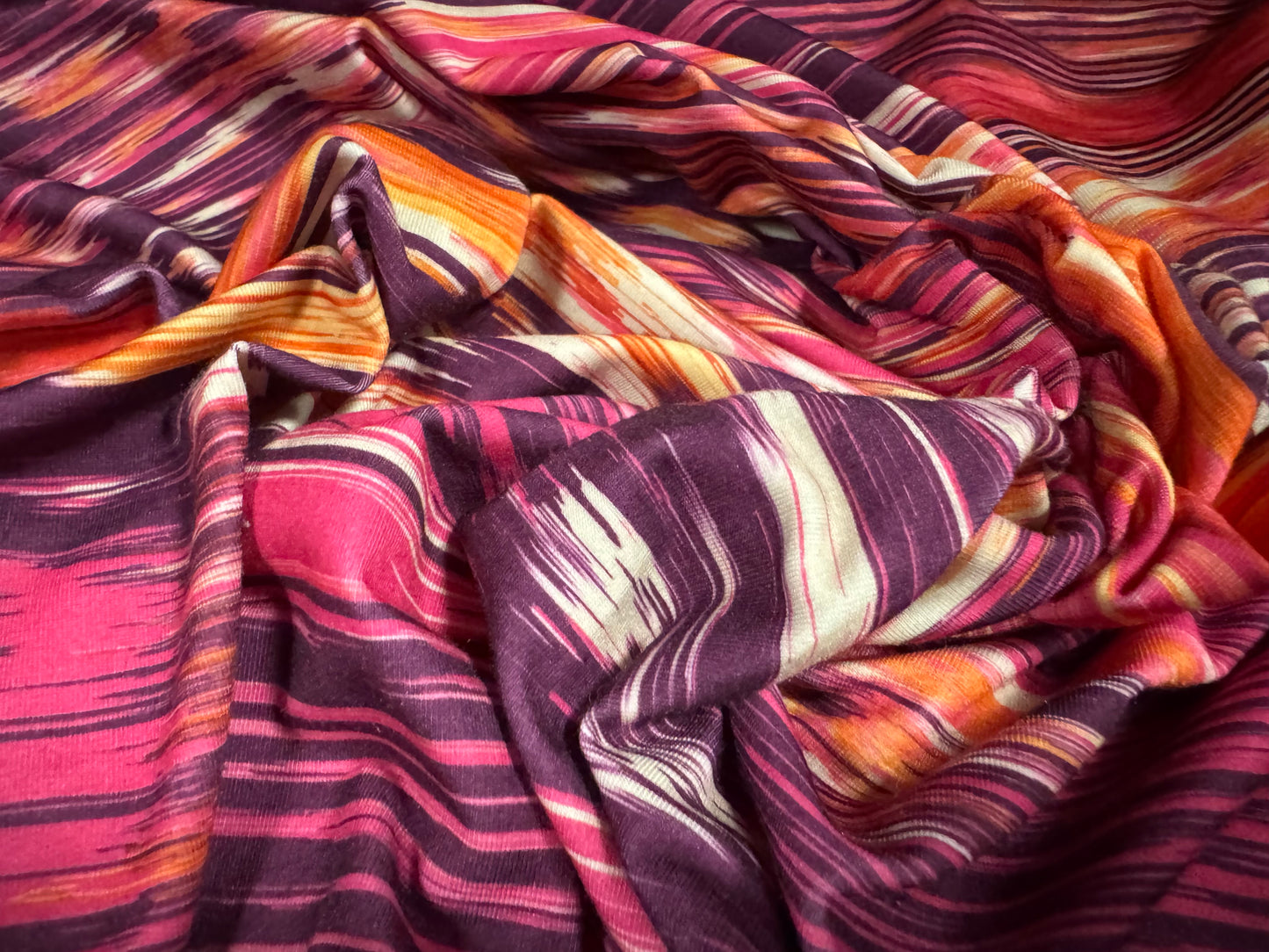 Stretch spandex interlock jersey fabric, per metre - abstract print - purple orange & magenta