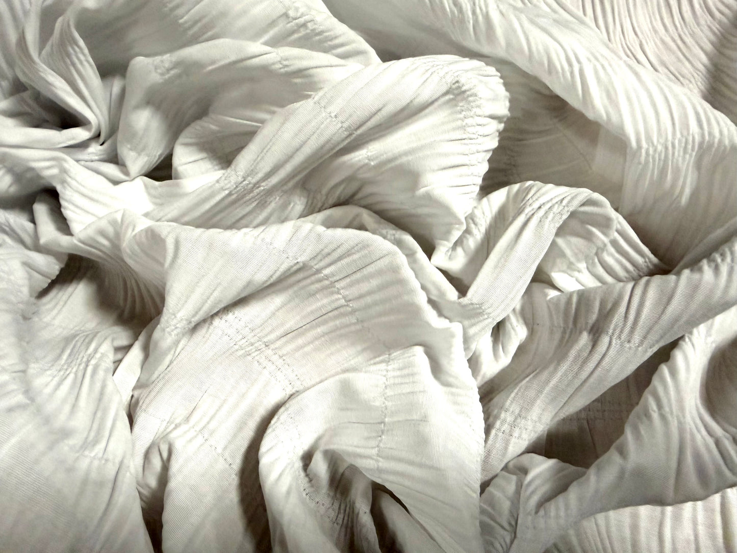 Ruched cotton bambula plain weave dress fabric, per metre - white