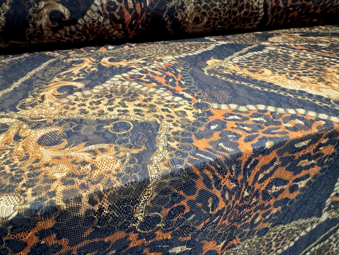 Stretch spandex lace fabric, per metre - leopard & chains print - black gold & orange