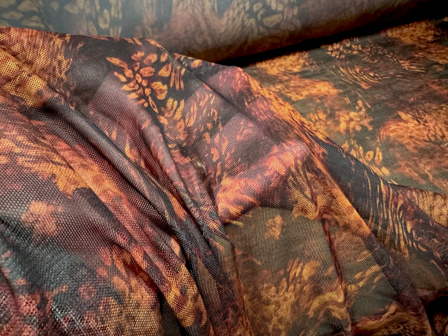 Power mesh net stretch spandex fabric, per metre - animal swirl print - orange & black
