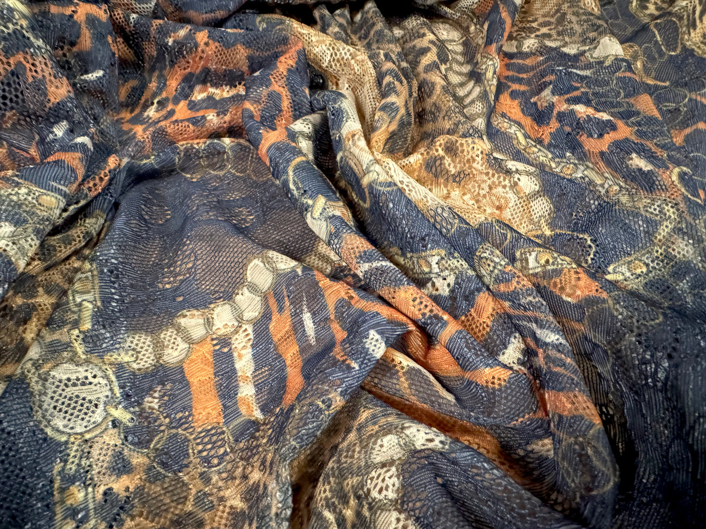 Stretch spandex lace fabric, per metre - leopard & chains print - black gold & orange