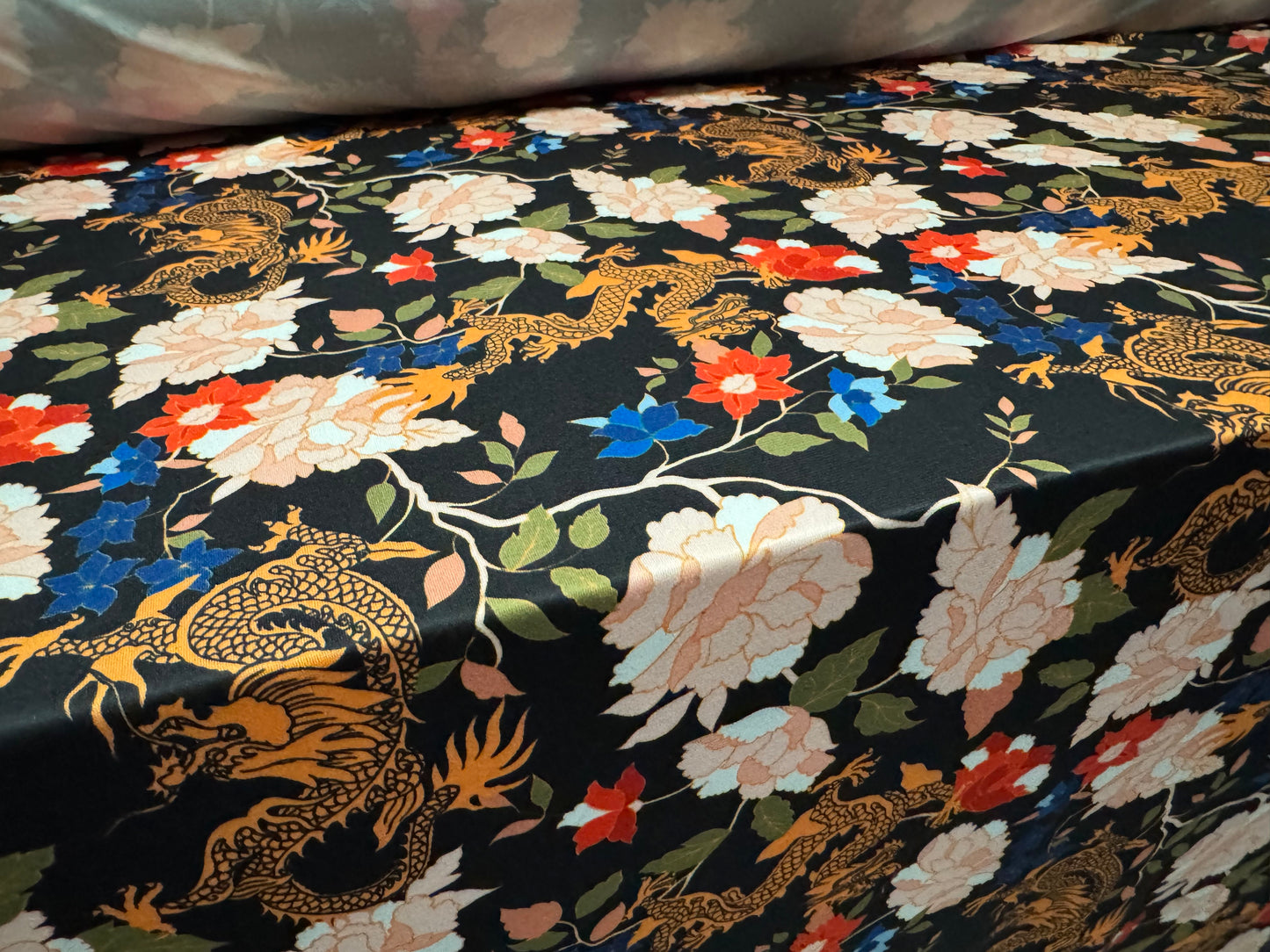 Soft touch stretch spandex single jersey fabric, per metre - dragons & flowers print - multicolour