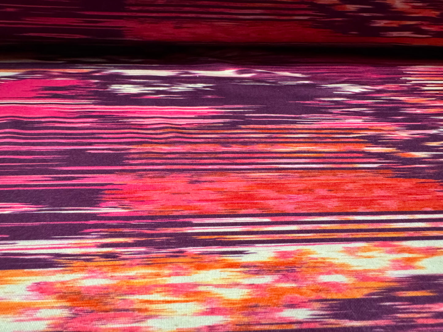 Stretch spandex interlock jersey fabric, per metre - abstract print - purple orange & magenta