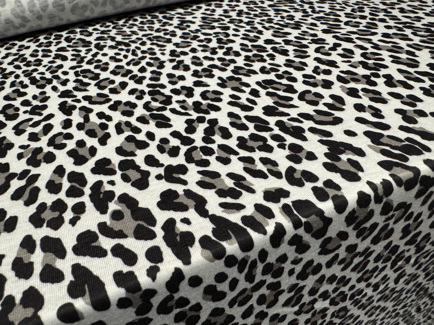 Soft handle single jersey fashion fabric, per metre - snow leopard print
