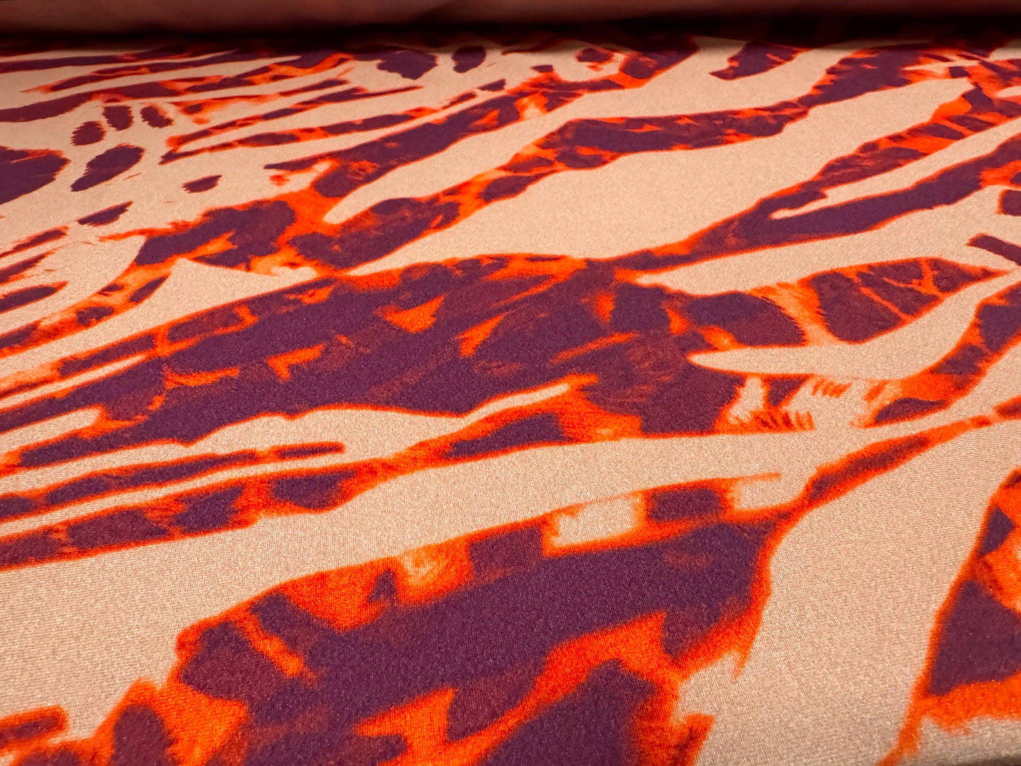 Yoga stretch spandex jersey fabric, per metre - stylised animal print - coral