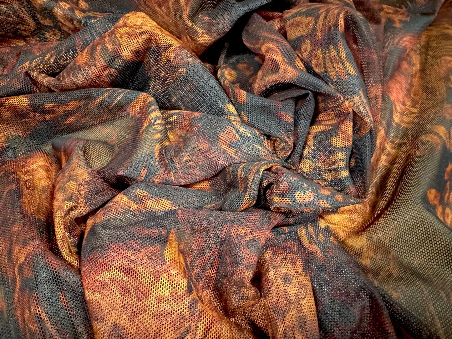 Power mesh net stretch spandex fabric, per metre - animal swirl print - orange & black