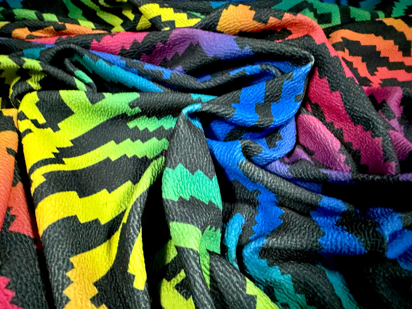 ‘Liverpool’ textured scuba stretch spandex jersey fabric, per metre - rainbow animal print - multicolour