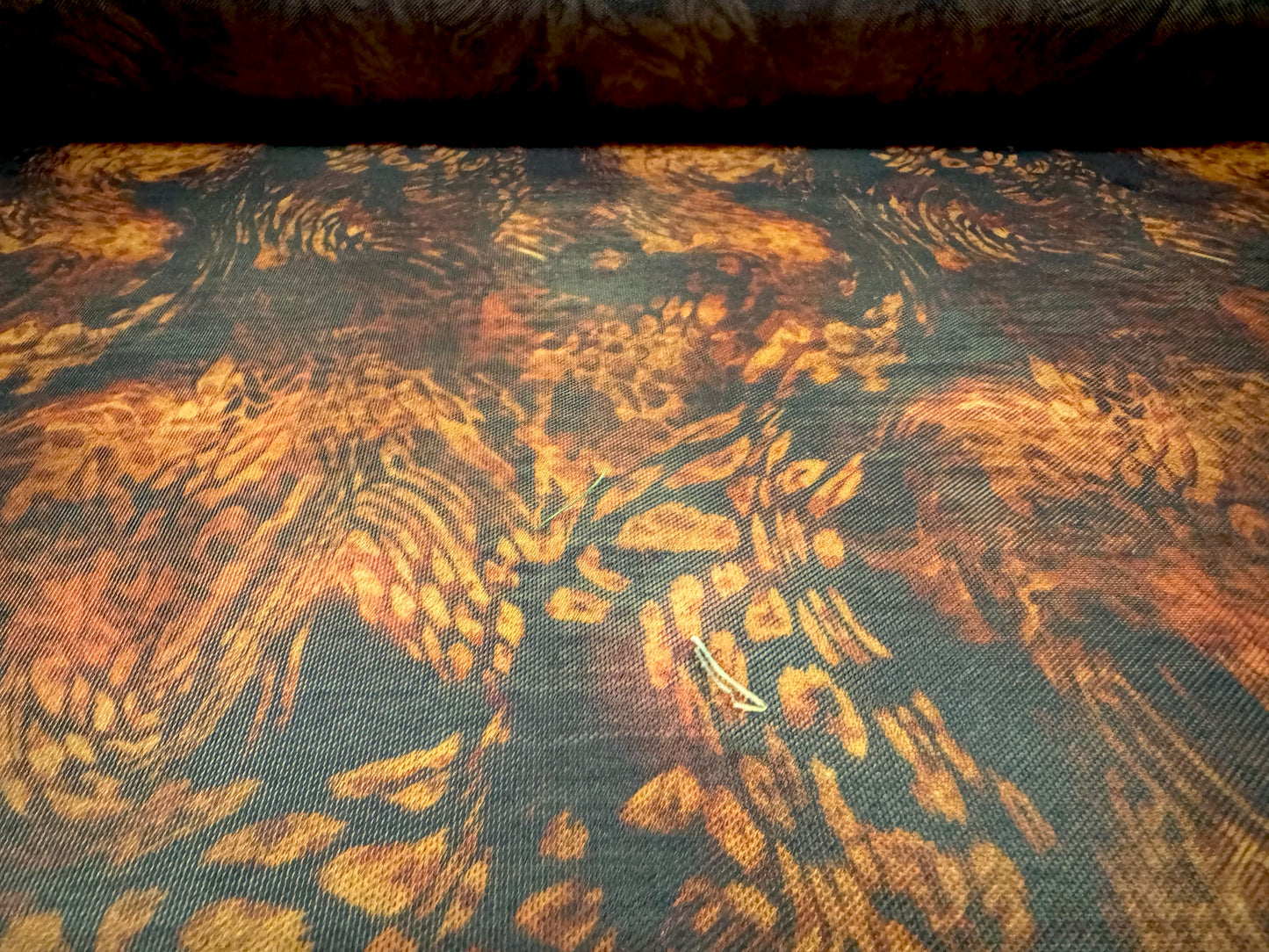 Power mesh net stretch spandex fabric, per metre - animal swirl print - orange & black