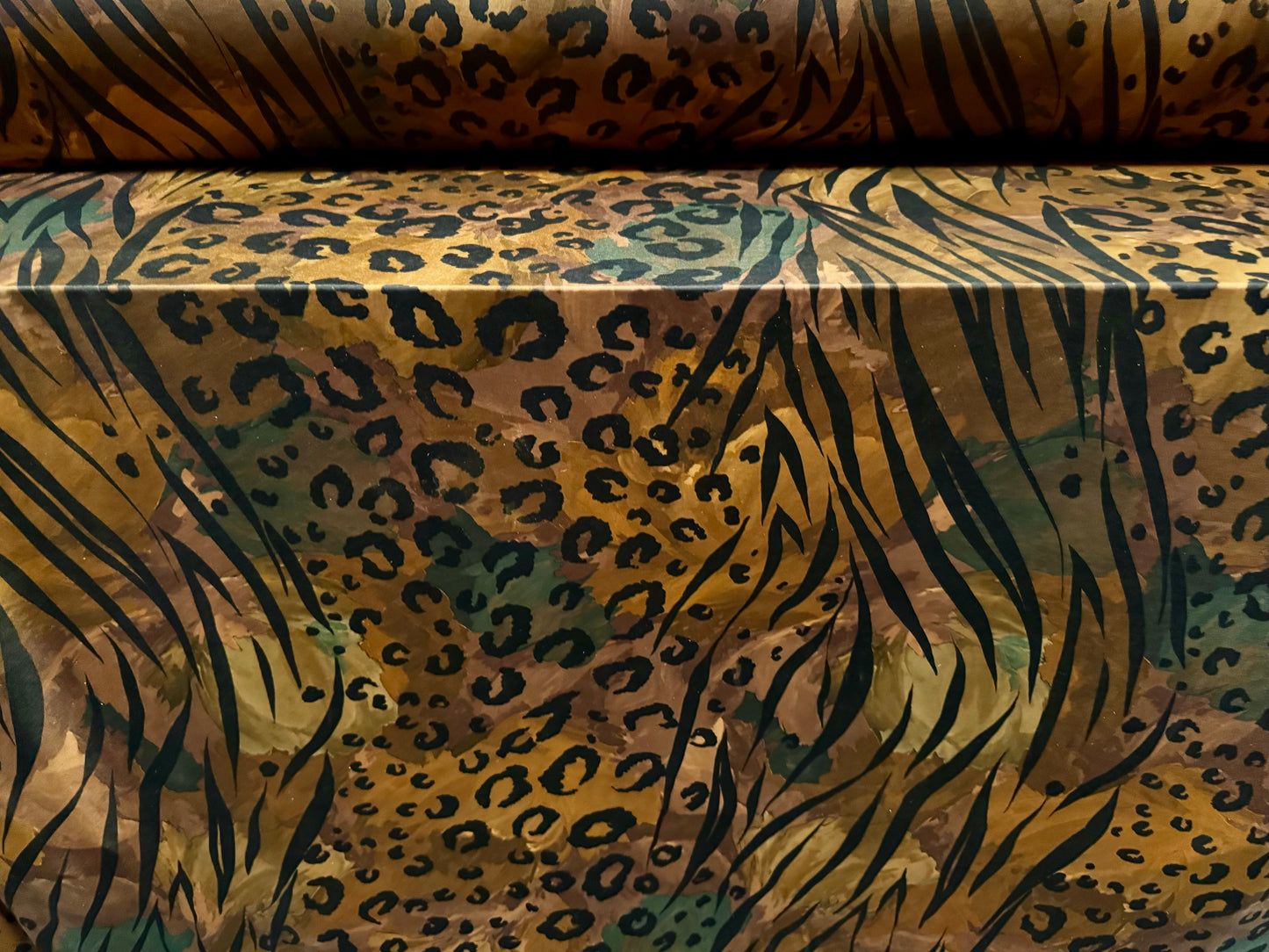 Soft touch stretch spandex single jersey fabric, per metre - stylised animal print - dark honey