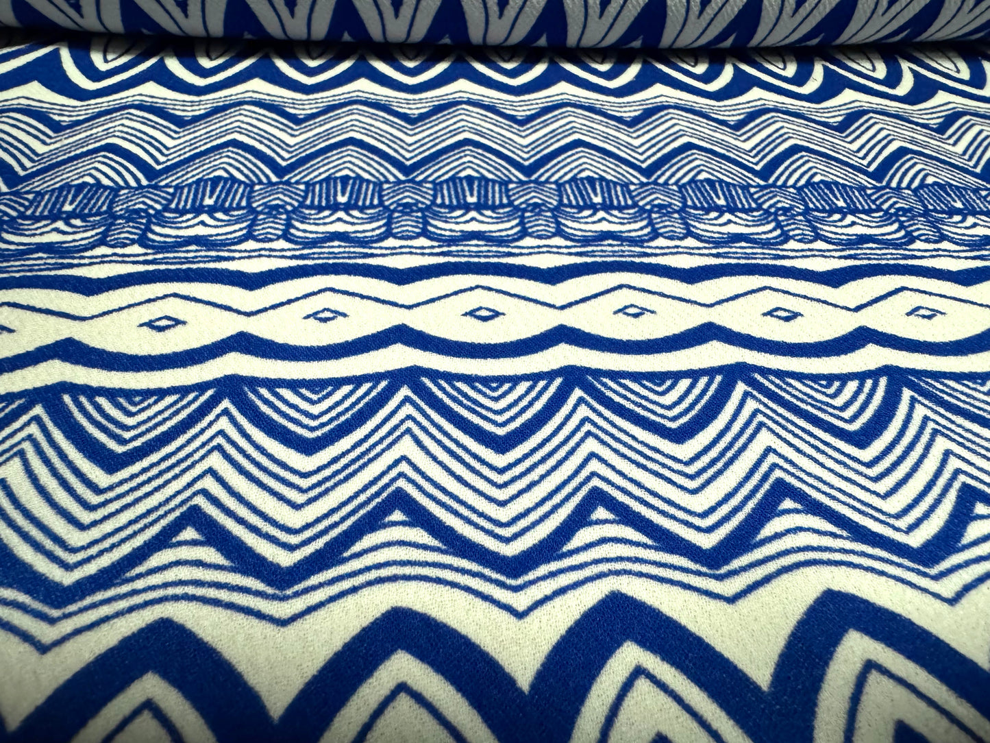 Heavyweight moss crepe woven dress fabric with comfort stretch - zig zag print - royal blue