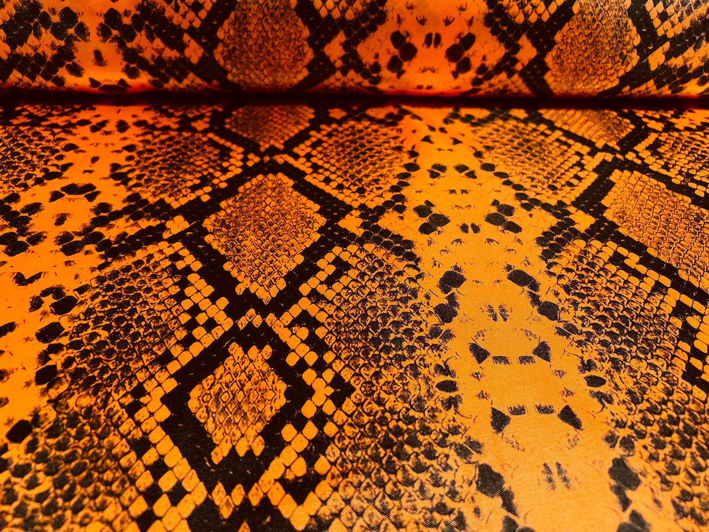 Silky Satin woven dress fabric, per metre - snakeskin animal print - orange