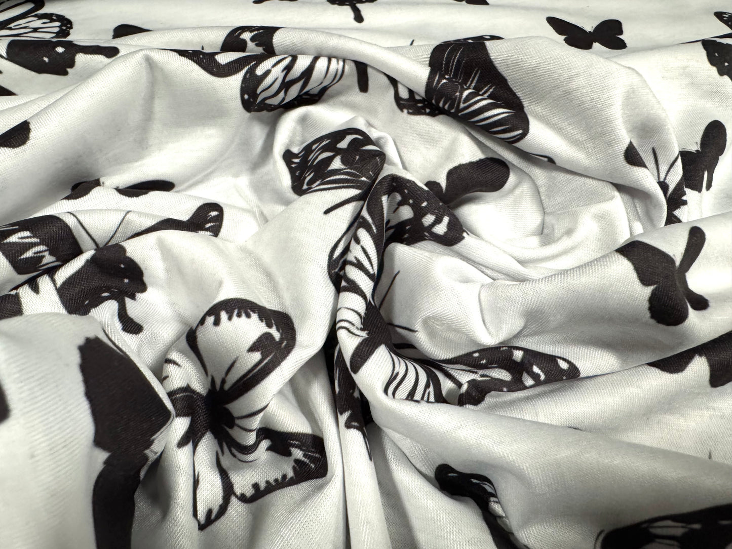 Soft handle stretch single jersey fabric, per metre - butterflies print - black & white