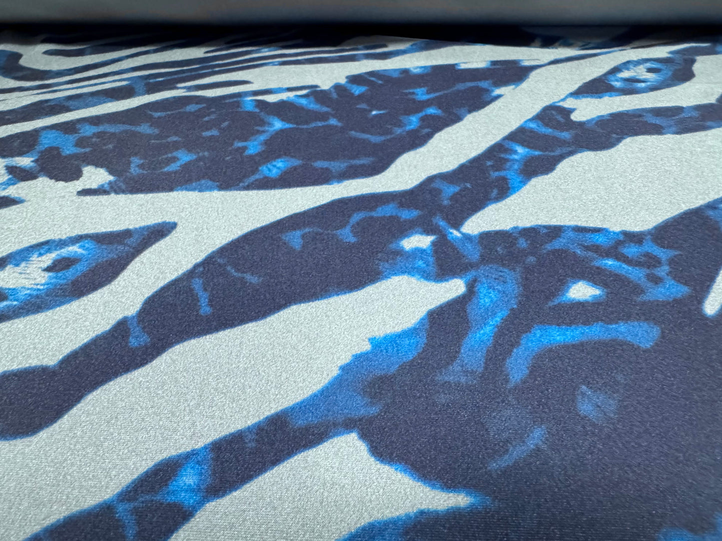 Yoga stretch spandex jersey fabric, per metre - stylised animal print - blue