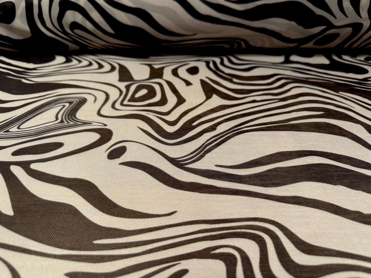 Power mesh net stretch spandex fabric, per metre - psychedelic zebra print - ebony & stone