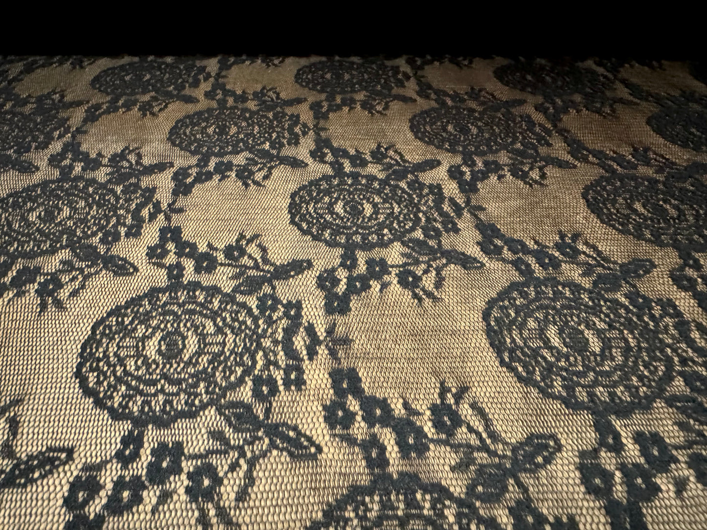 Lightweight flocked mesh fabric, per metre - stylised flower - black