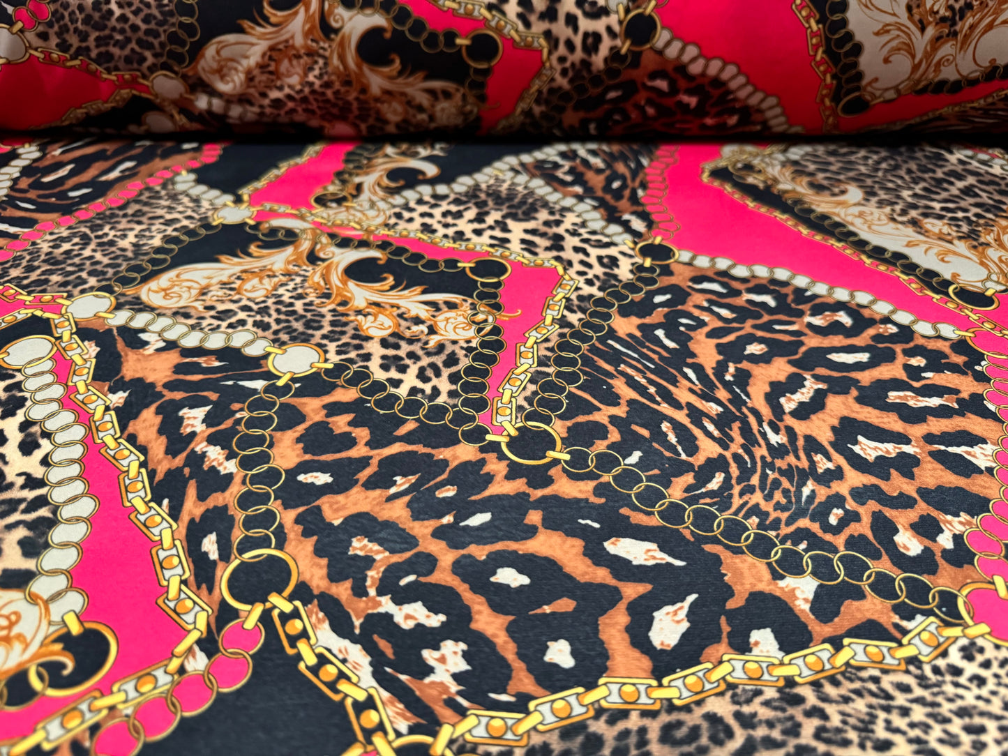 Soft touch stretch spandex single jersey fabric, per metre - leopard and chains print - black gold & pink