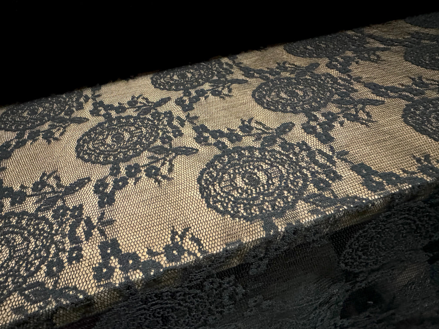 Lightweight flocked mesh fabric, per metre - stylised flower - black
