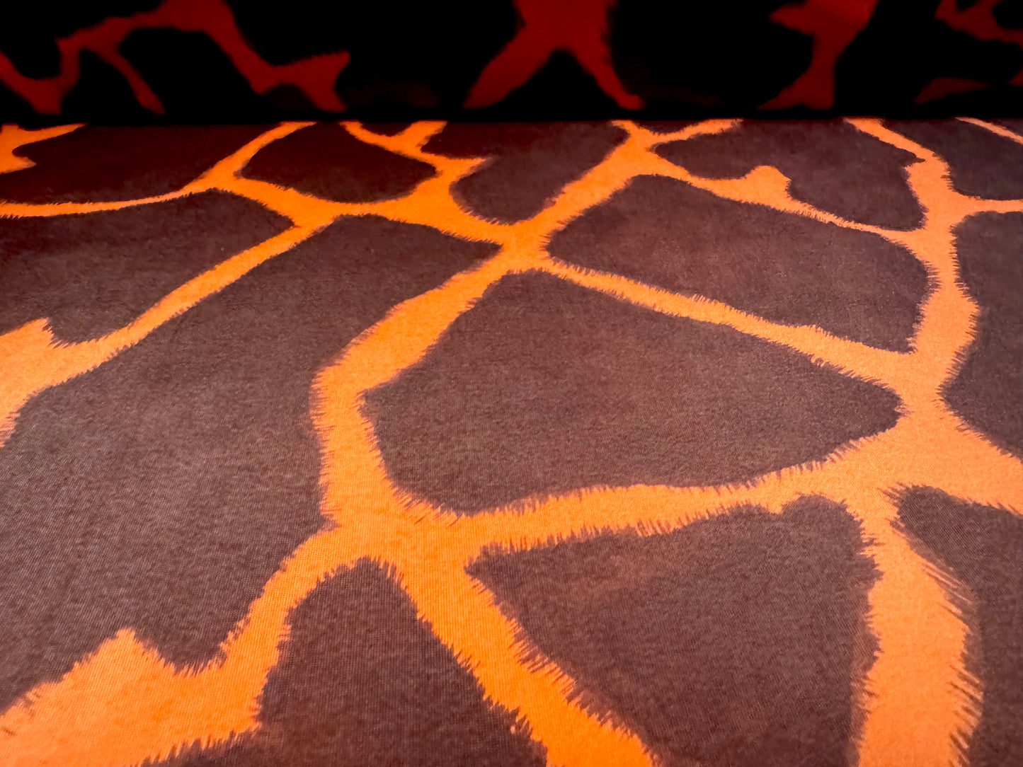 Disco shimmer stretch spandex jersey fabric, per metre - giraffe animal print - orange & brown