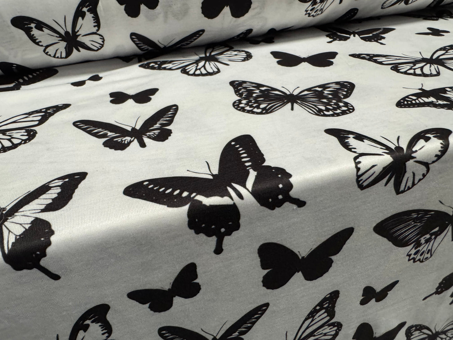 Soft handle stretch single jersey fabric, per metre - butterflies print - black & white