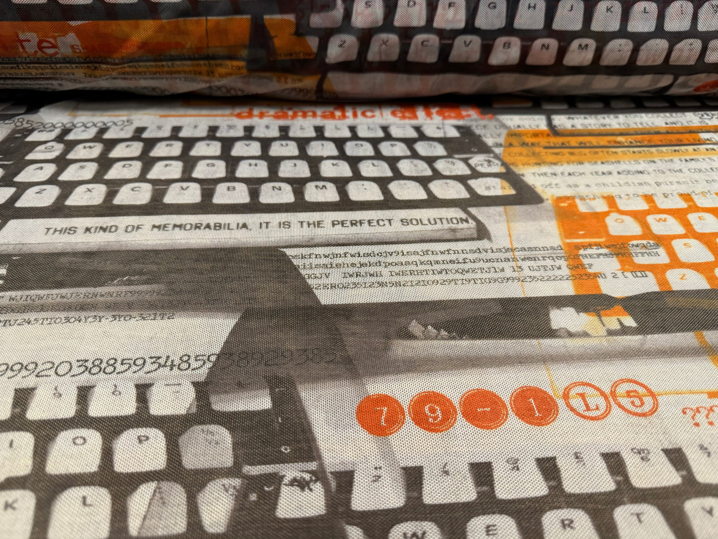 Power mesh net sheer stretch spandex fabric, per metre - retro typewriter print - Orange & charcoal