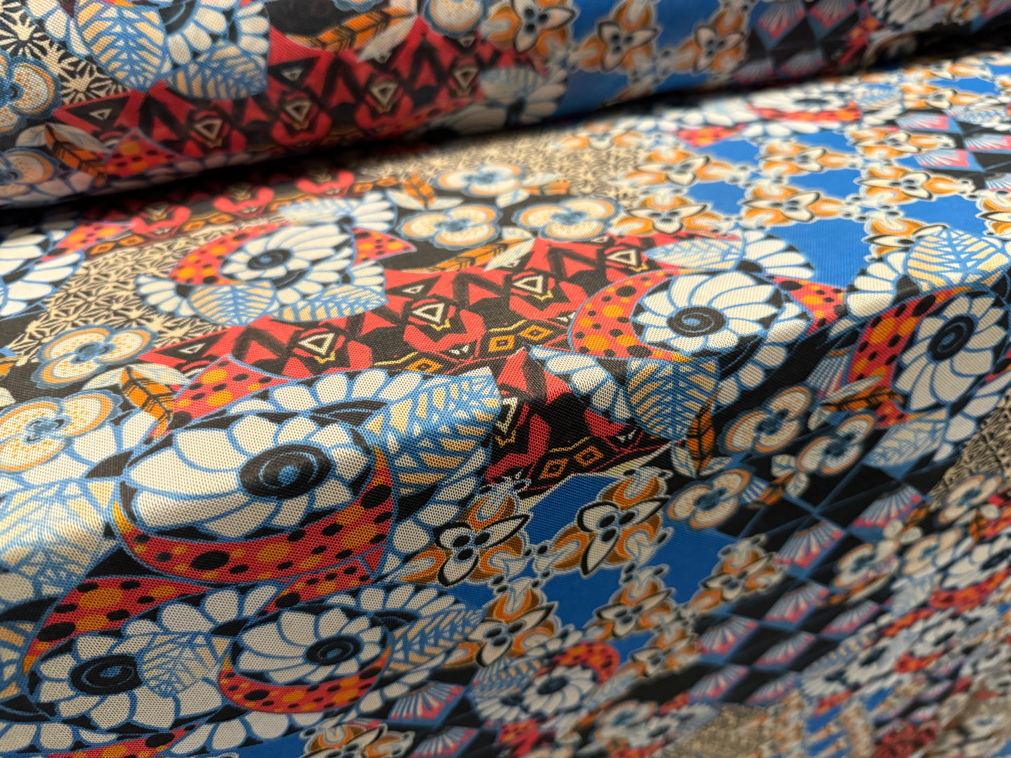 Power mesh net sheer stretch spandex fabric, per metre - stylised flower print - multicolour