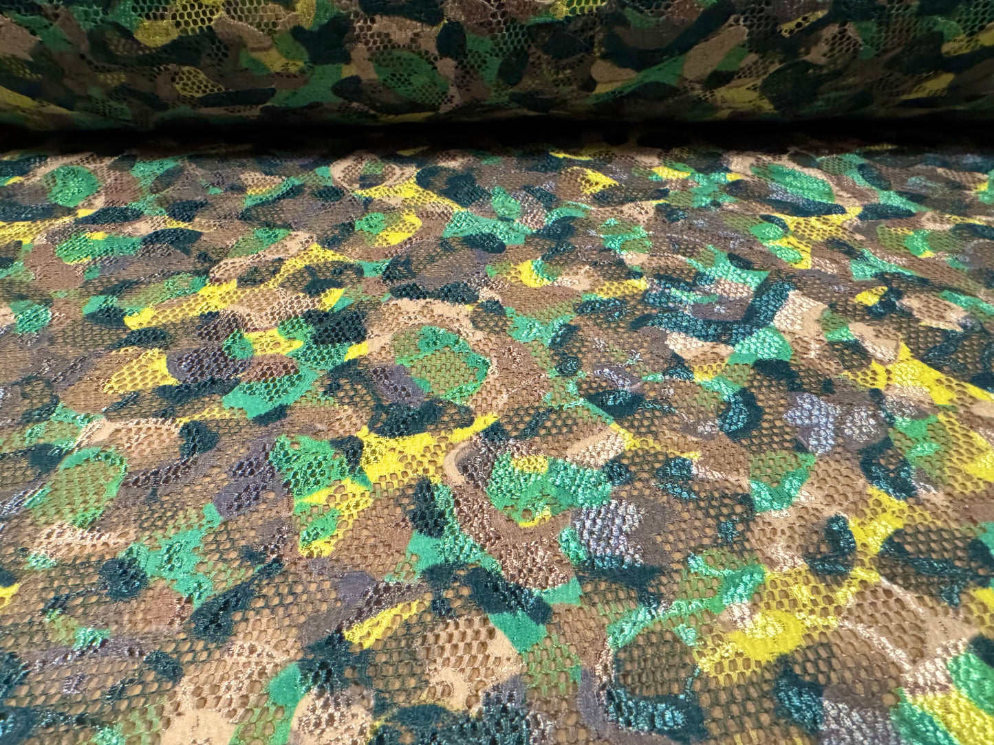 Stretch spandex lace fabric, per metre - stylised animal print - green & yellow