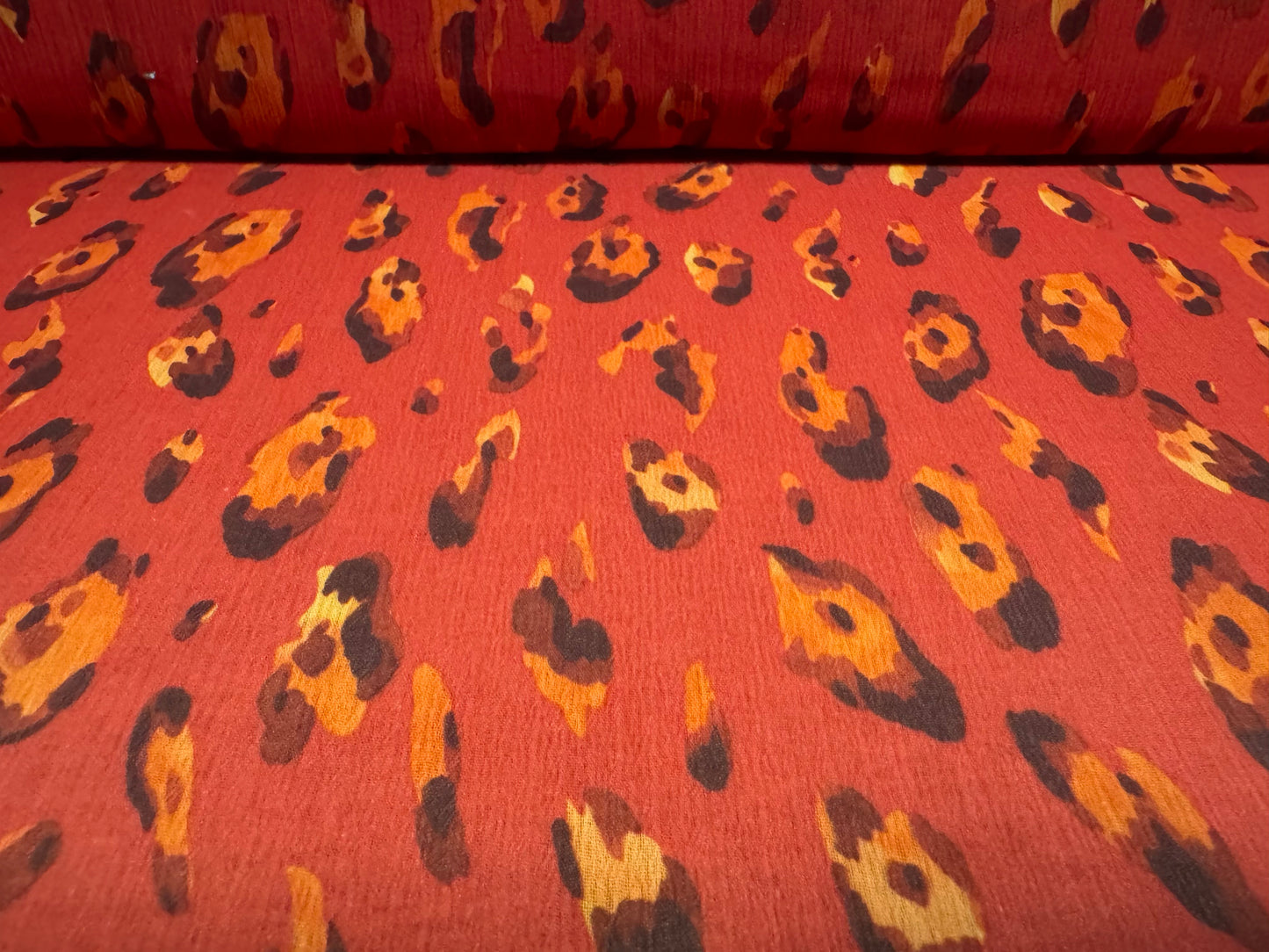 Chiffon yoryu woven dress fabric, per metre - distressed leopard print - red