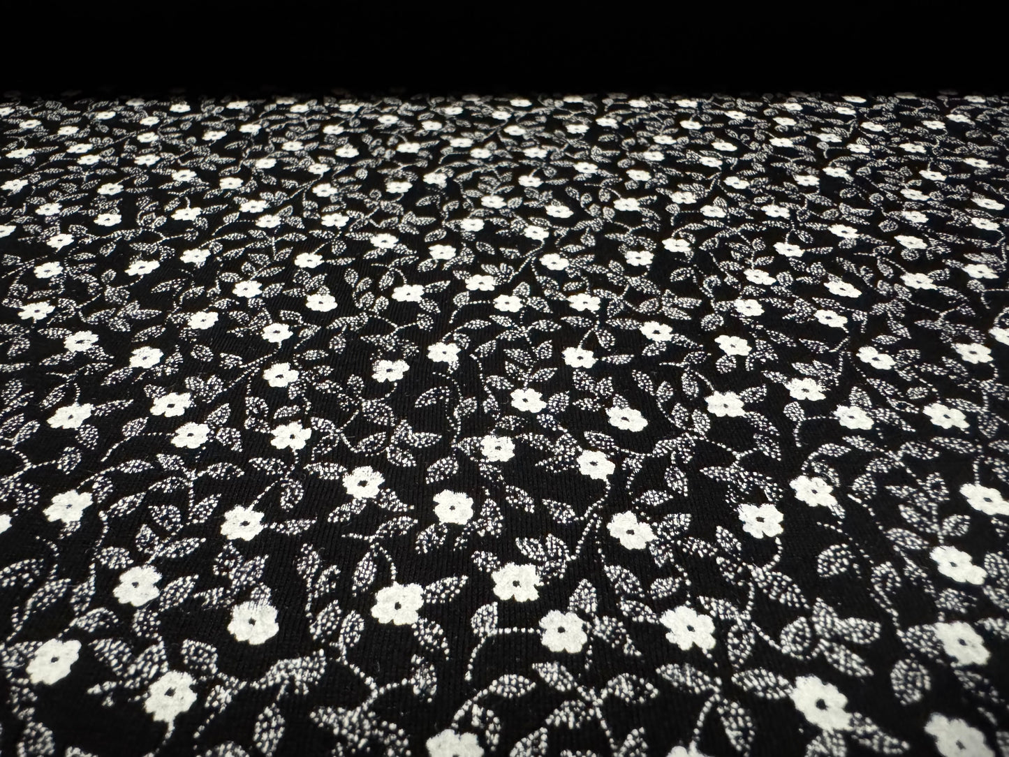 Viscose spandex stretch single jersey fabric, per metre - small ditsy flower print - black & white