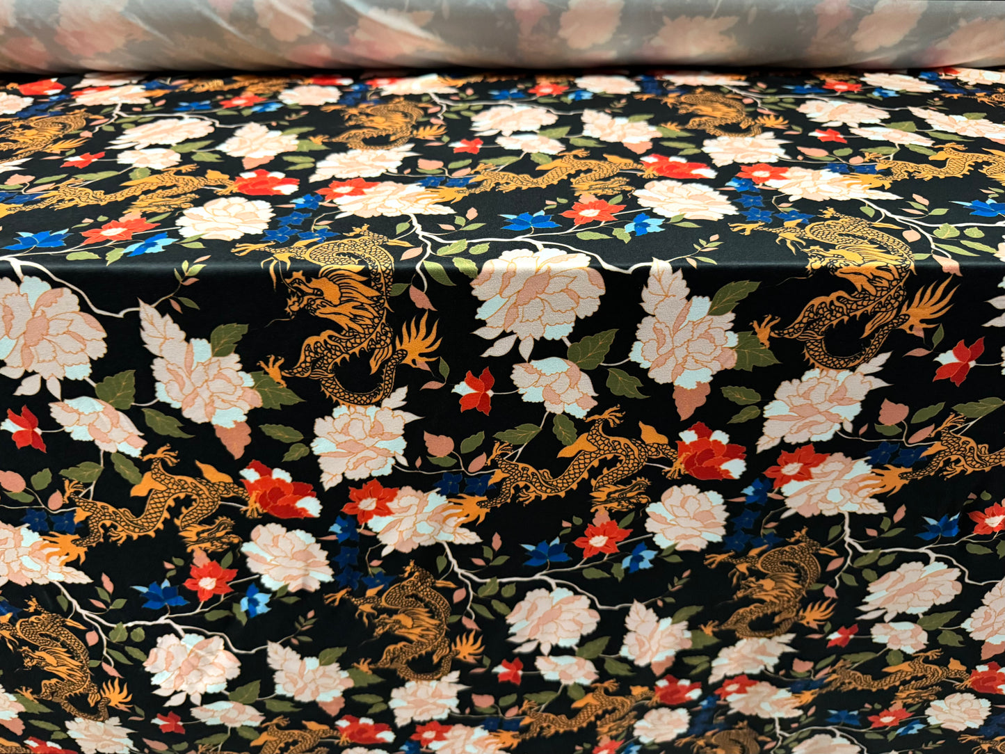 Soft touch stretch spandex single jersey fabric, per metre - dragons & flowers print - multicolour