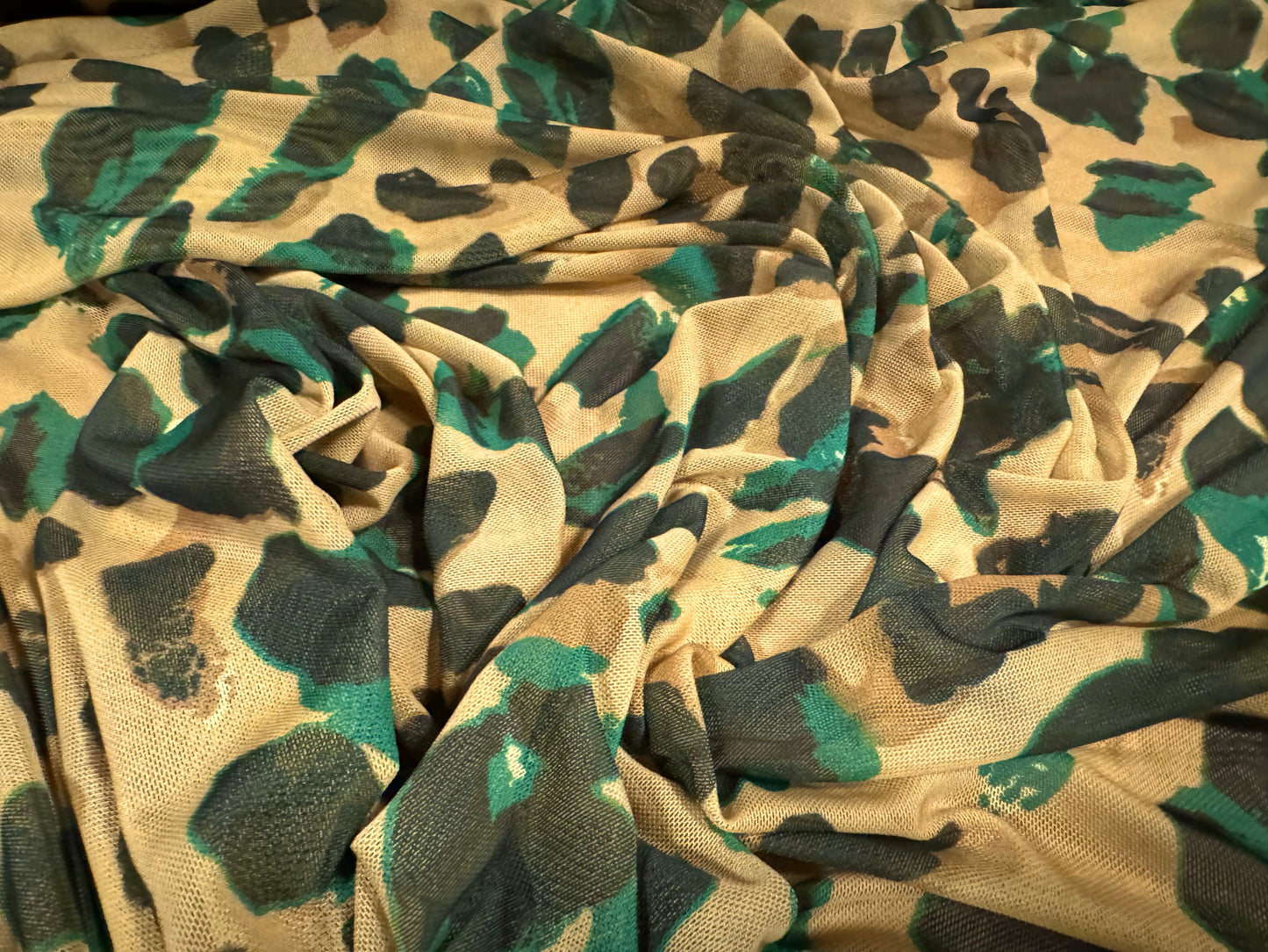 Power mesh net stretch spandex fabric, per metre - stylised animal print - beige & emerald green
