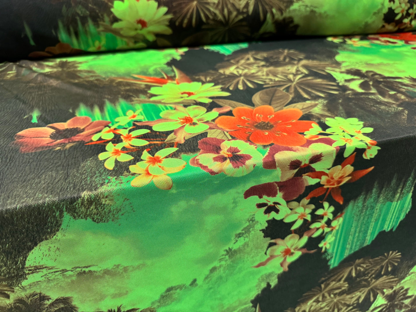 Power mesh net stretch spandex fabric, per metre - Hawaiian tropical paradise print - green black & orange