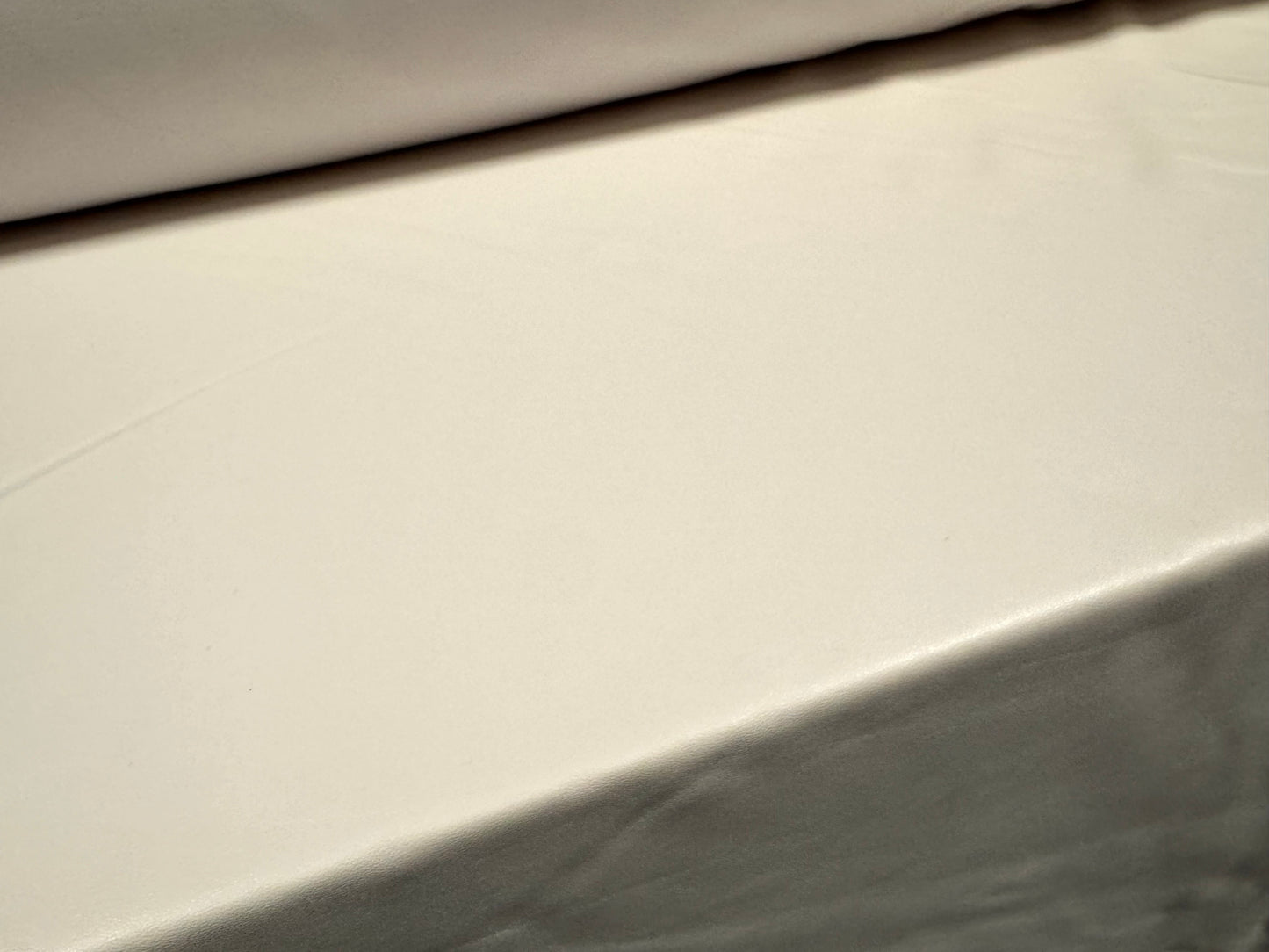 Stretch pvc spandex jersey leather look fabric, per metre - cream