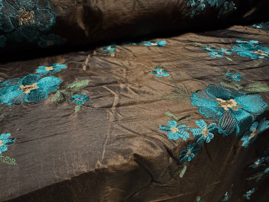 Taffeta faux silk fabric - dark brown with turquoise embroidered flowers