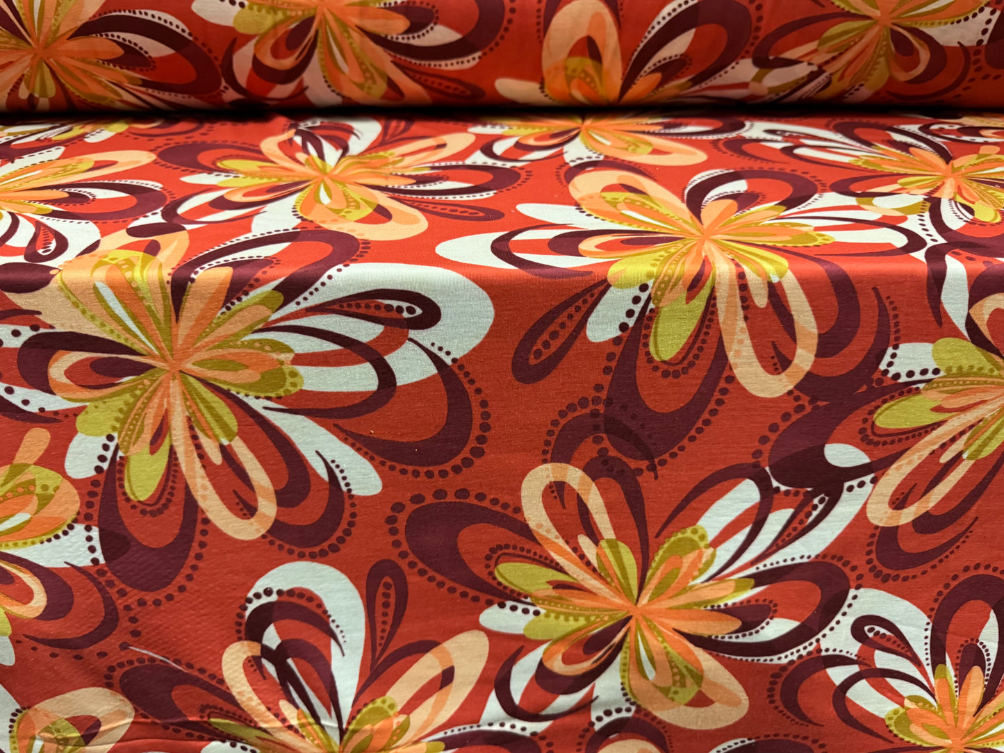 Stretch spandex interlock jersey fabric, per metre - retro flower print - burnt coral
