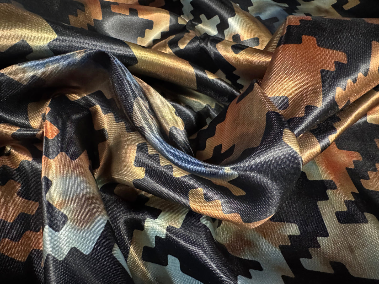 Silky satin woven dress fabric, per metre - jumbo houndstooth print - black & orange