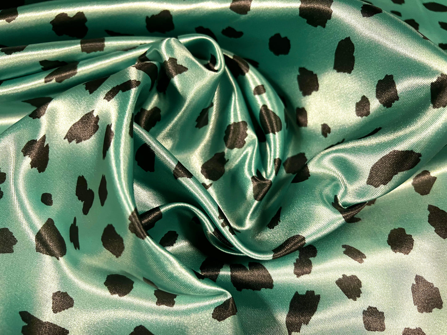 Silky Satin woven dress fabric, per metre - Dalmatian animal print - mint