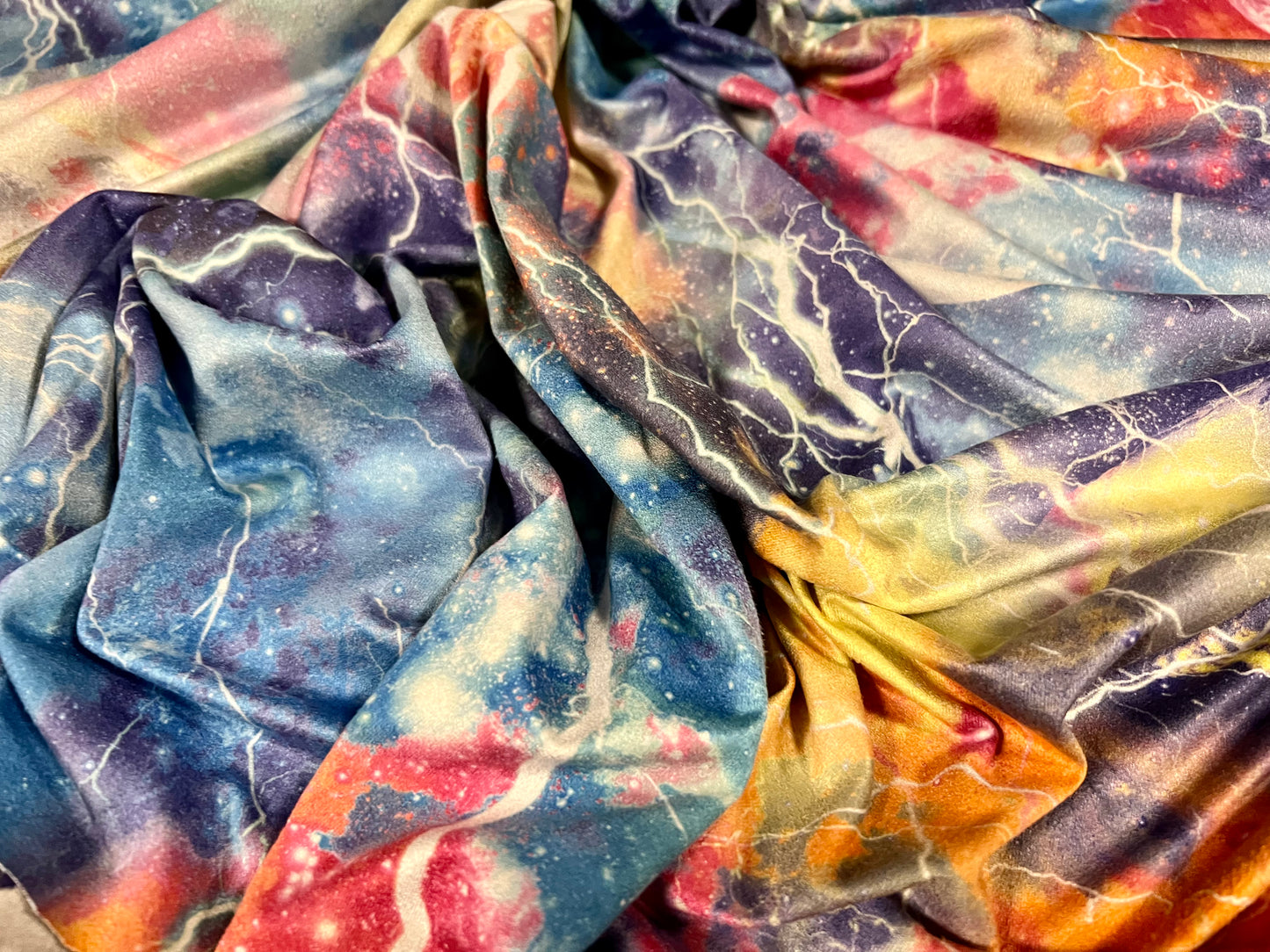 Faux suede stretch spandex jersey fabric, per metre - cosmic lightning print - multicolour