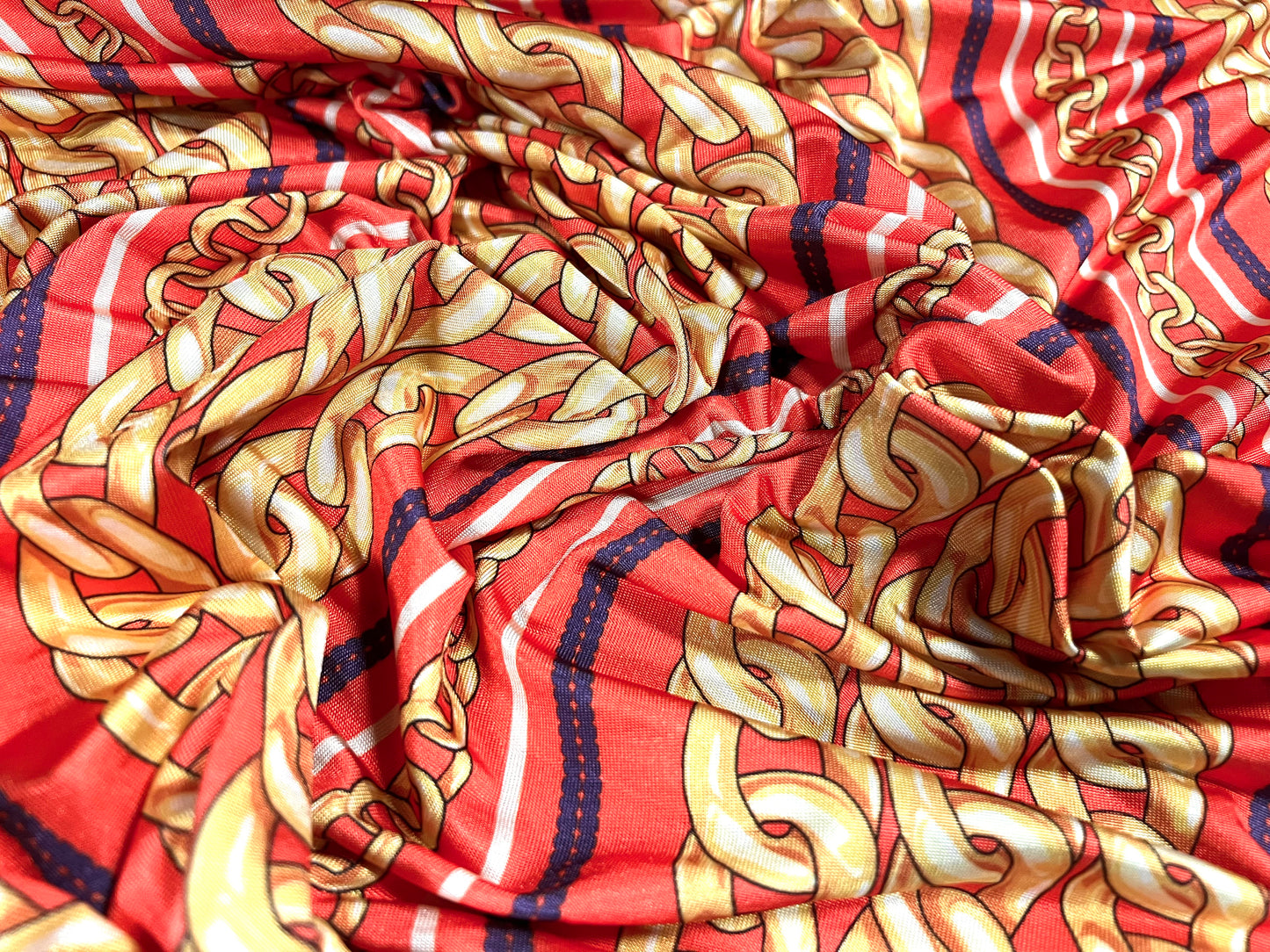 Stretch spandex jersey fabric, per metre - designer chains print - coral pink & gold