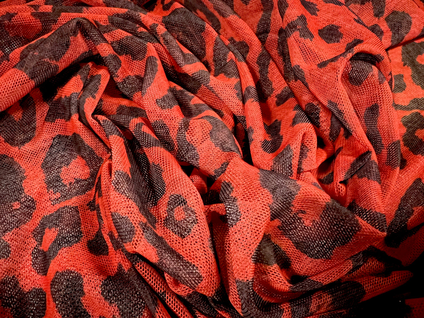 Power mesh net sheer stretch spandex fabric, per metre - cheetah animal print - red & black