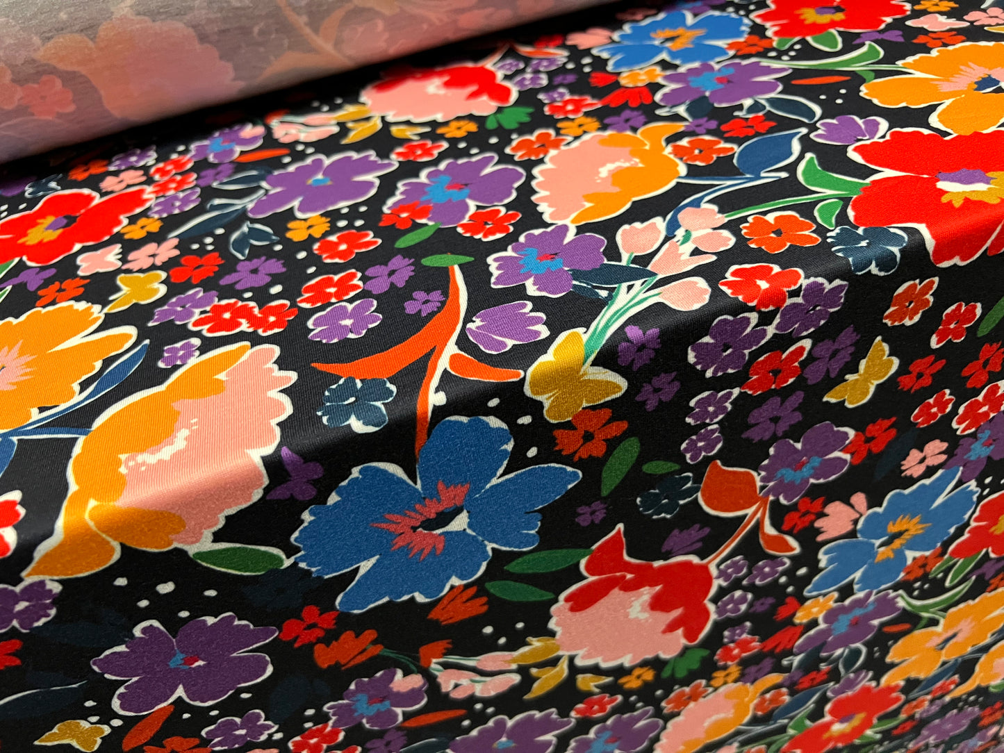 Soft handle stretch single jersey fabric, per metre - Night Garden print - black with multicolour flowers