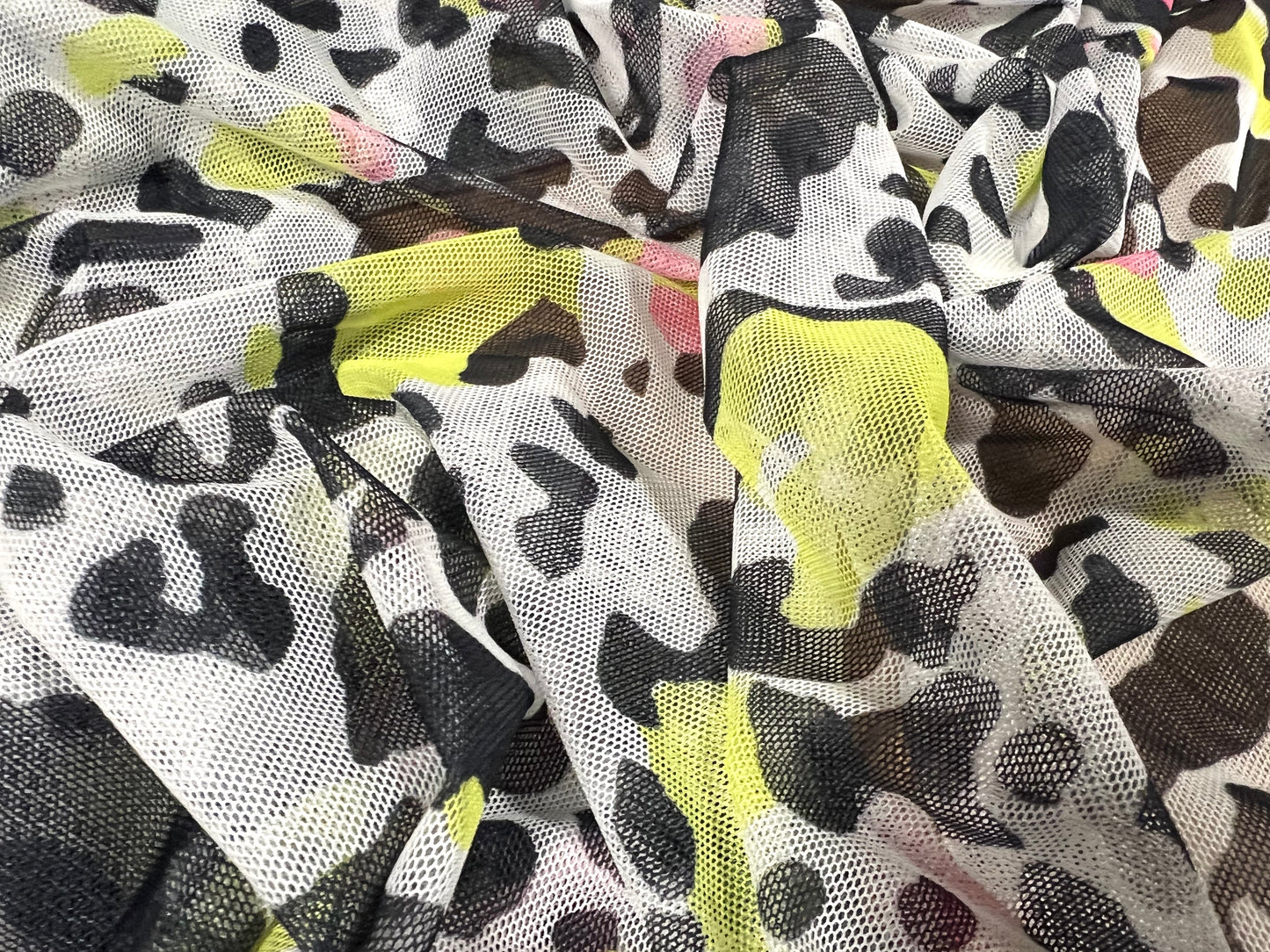 Power mesh net sheer stretch spandex fabric, per metre - stylised cheetah print - white black pink & lime
