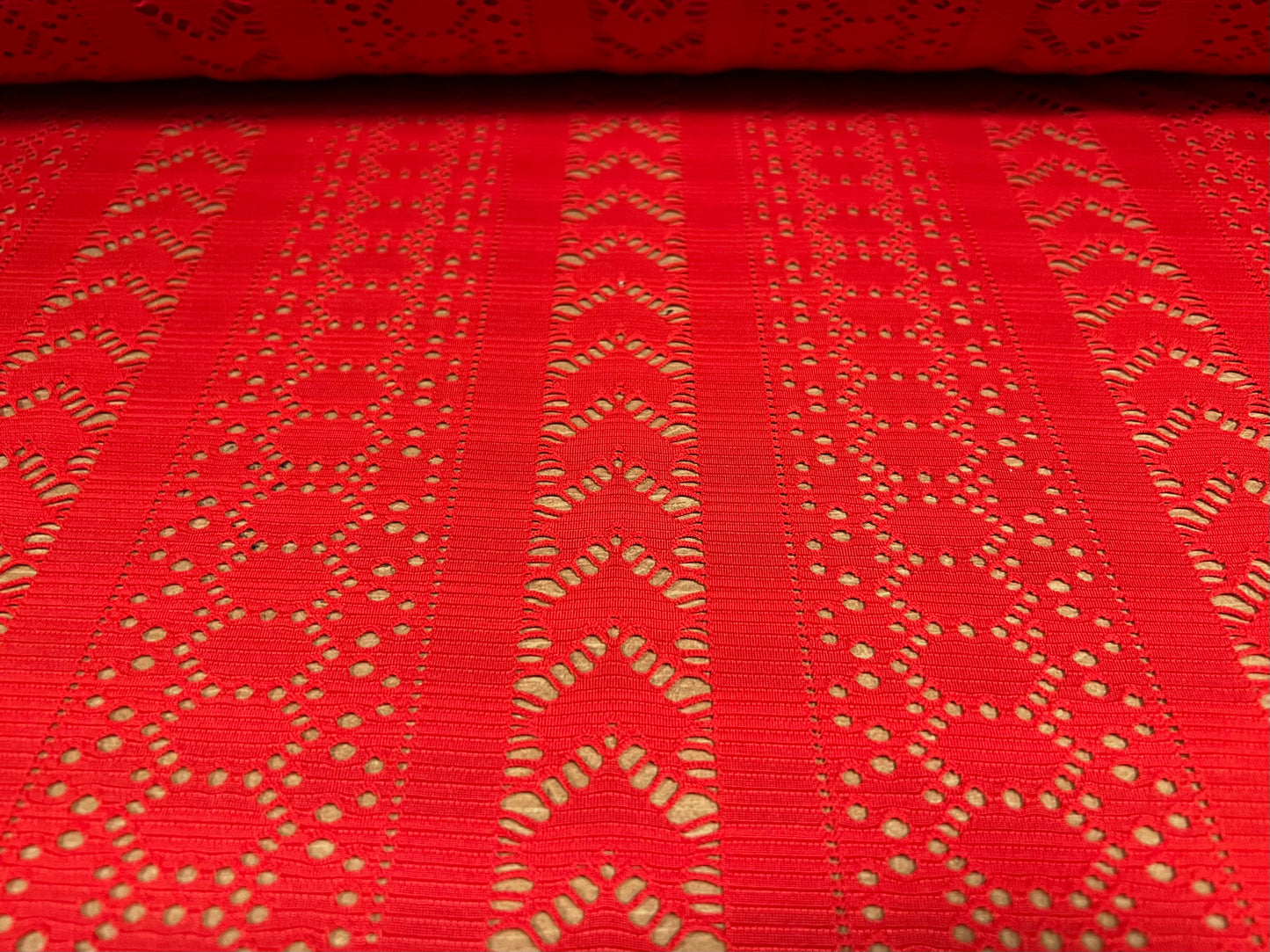 Crochet lace jersey knit fabric, per metre - geometric stripe - red