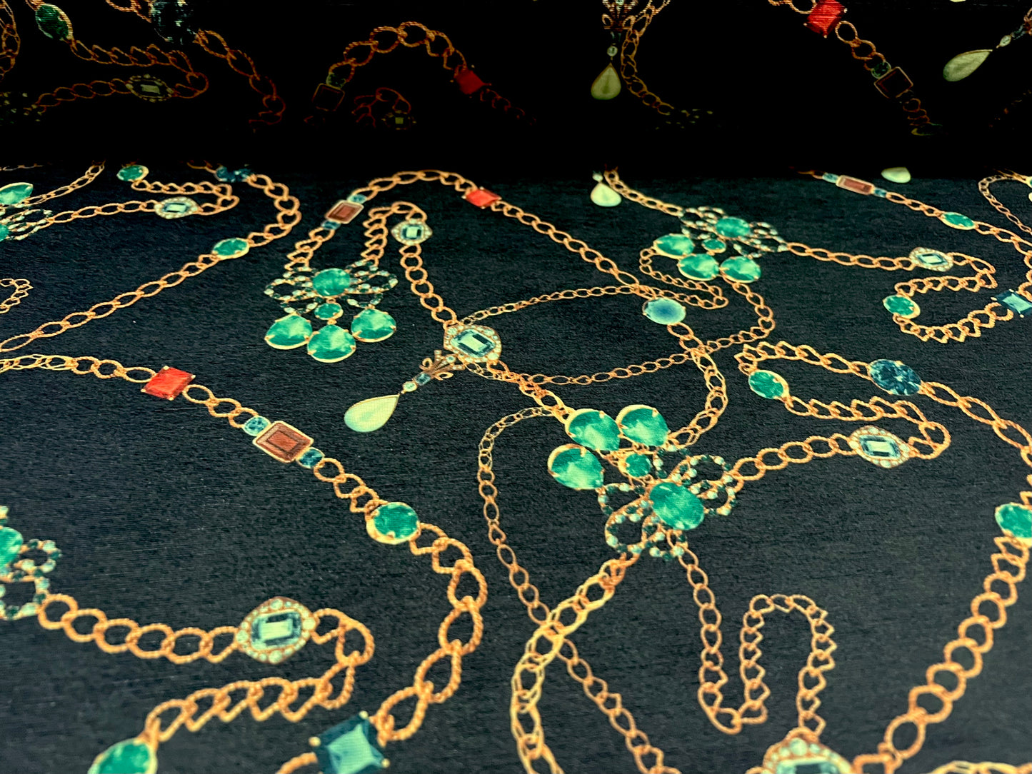 Finely textured stretch spandex single jersey fabric, per metre - jewels & chains print - black and emerald green