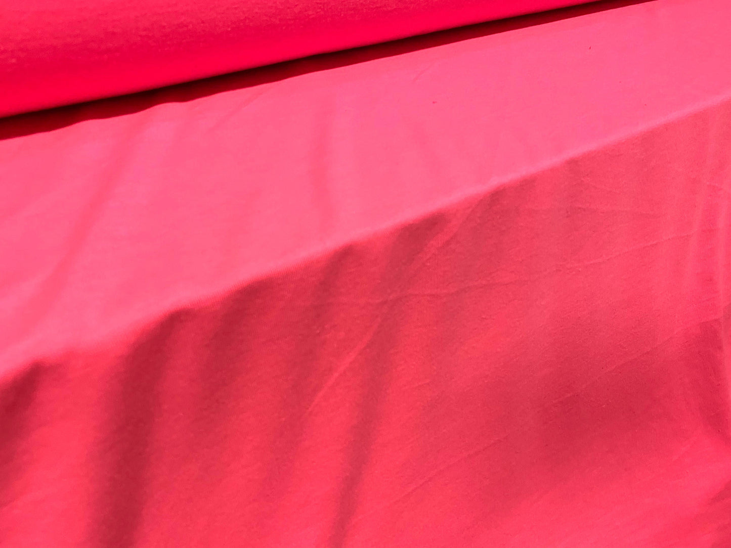 Spun polyester single jersey fabric, per metre - fluorescent pink