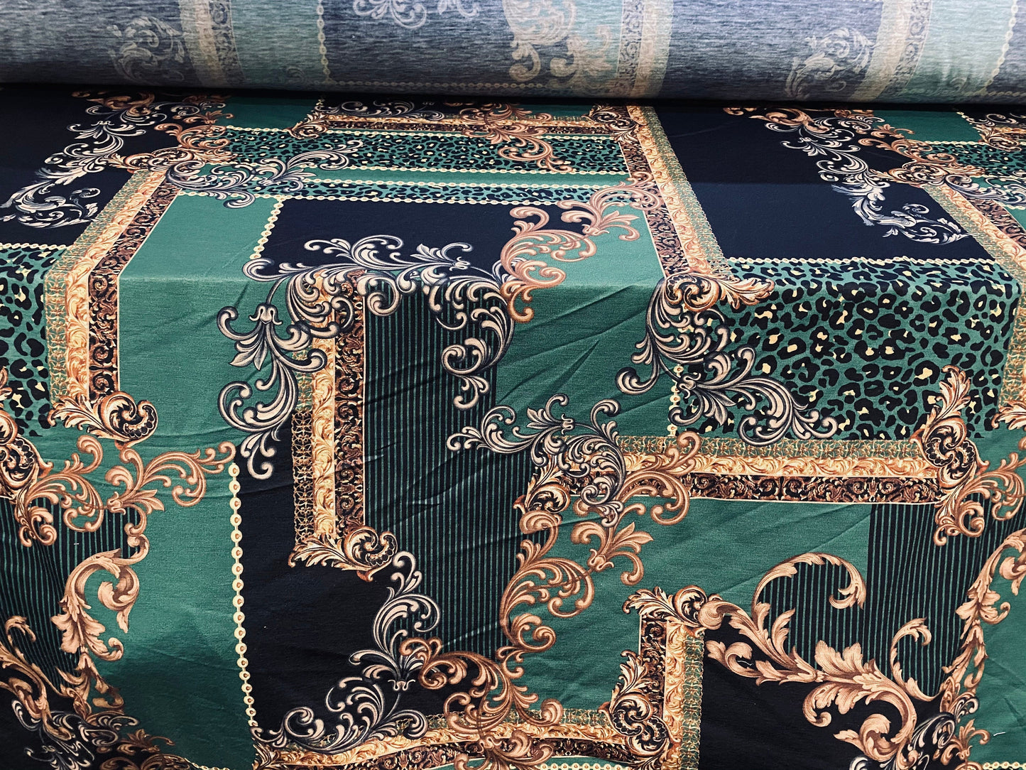 Soft handle jersey fabric, per metre - green black & gold framed paisley print